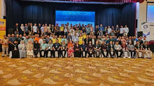 Symposium participants gathered in the main hall