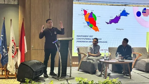 National programme stage with two organisers' representatives